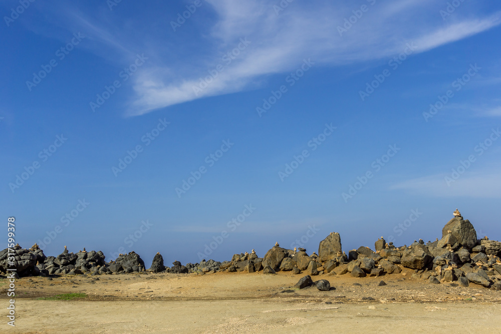 Rock Cairn Field on the Rugged Eastern Coastline of Aruba Near the Natural Bridge.