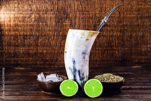 Tereré or Tererê, is a Brazilian drink made with the infusion of yerba mate in cold water. Drink prepared with yerba mate and lemon.