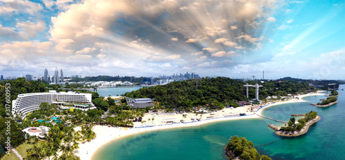 Photography Panoramic aerial view of Siloso Beach and Sentosa Island at sunset, Singapore