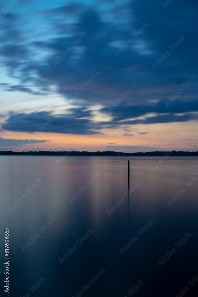 Fototapeta premium sunset over lake