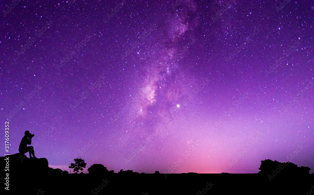 Panorama blue night sky milky way and star on dark background.Universe filled with stars, nebula and galaxy with noise and grain.Photo by long exposure and select white balance.Dark night sky.