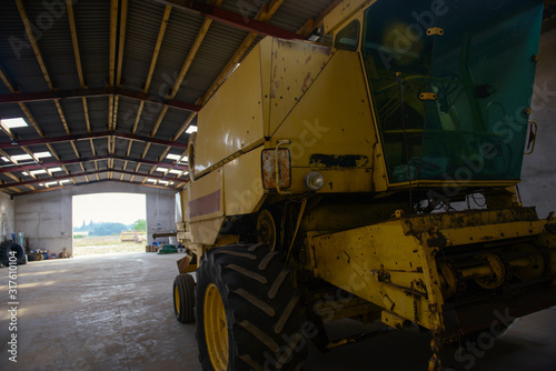 combine harvester in the garage