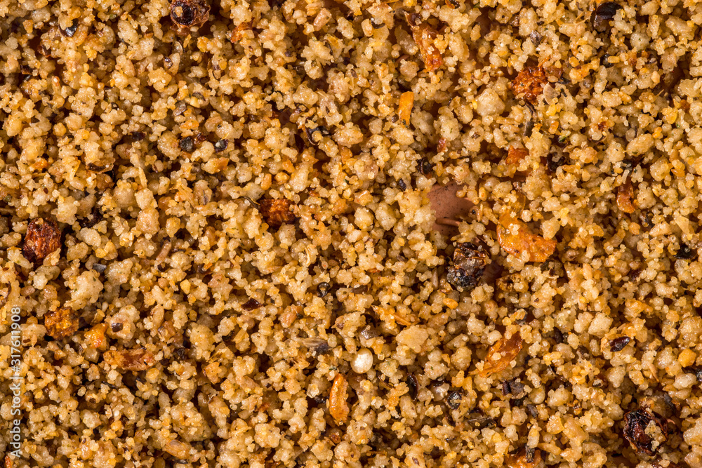 Close-up of healthy winter bird food patee for frugivorous and insectivorous garden birds containing seeds, fruits, insects and minerals Close-up of healthy winter bird food patee for frugivorous and insectivorous garden birds containing seeds, fruits, insects and minerals