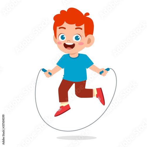 happy cute kid boy play jump rope