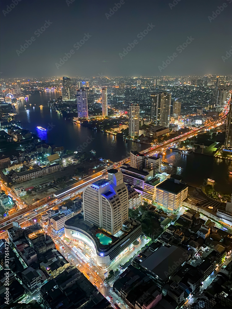 BANGKOK, THAILAND - DECEMBER 14, 2019: Aerial view of the city at night