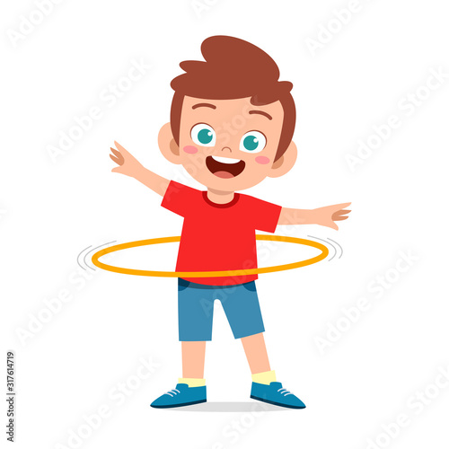 happy cute little kid boy play hula hoop