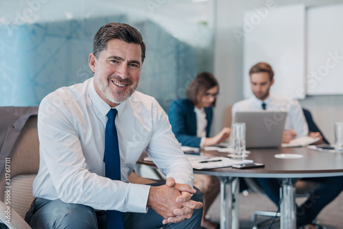 Smiling with success in the office