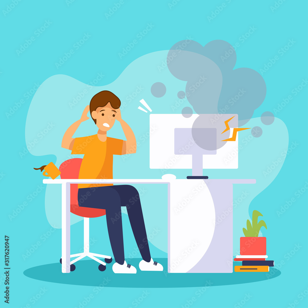 Sad man sits in front of a broken computer. Scared office worker holds his head. Computer is smoking. Sad man sits in front of a broken computer. Scared office worker holds his head. Computer is smoking.