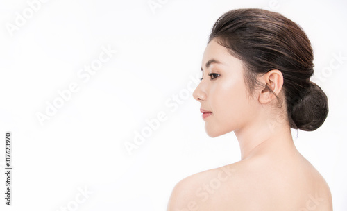 Closeup portrait of beauty asian woman with fair perfect healthy glow skin half face, young beautiful asia girl with pretty smile on her face. Beauty korean clinic skincare concept banner
