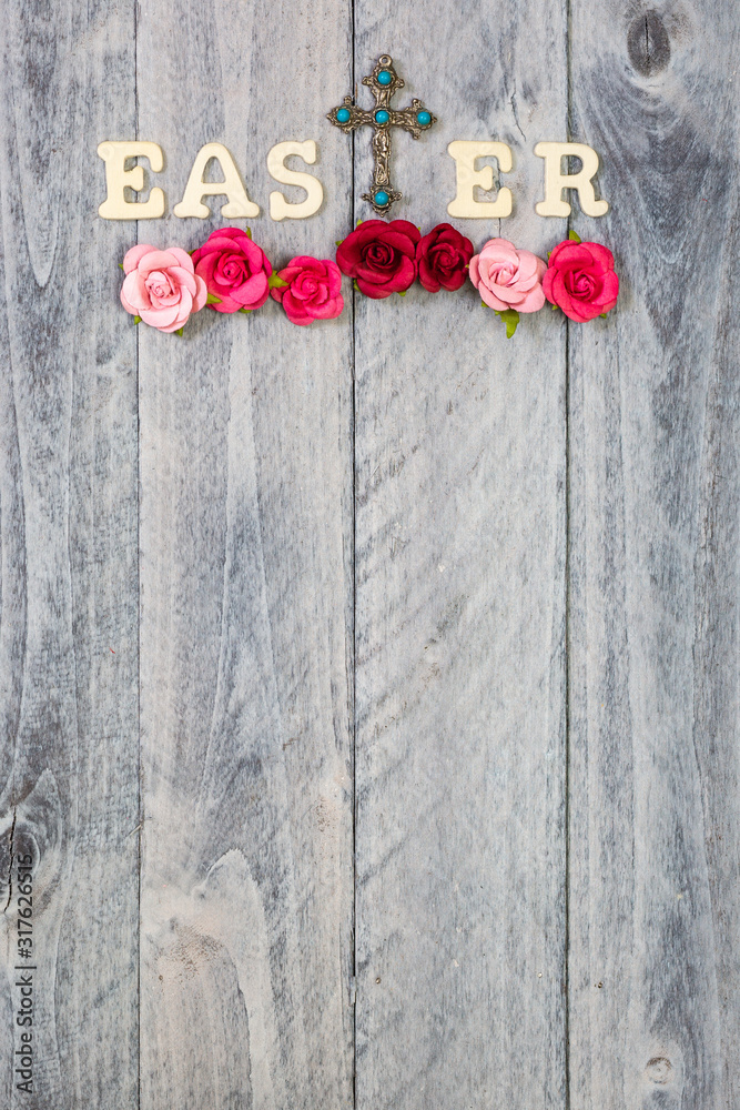 Wood background with Easter, cross and flowers with plenty of copy space Wood background with Easter, cross and flowers with plenty of copy space
