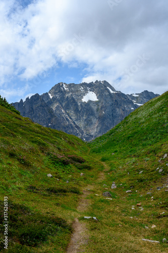 Faint Trail Climbs Through Valley