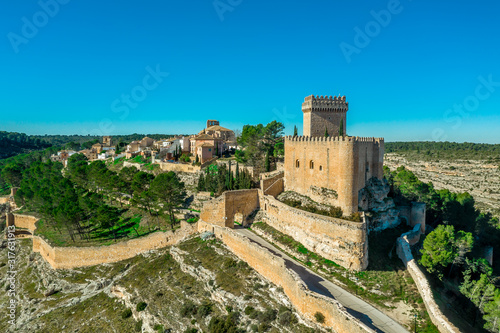 Aerial view of Alarcon castle, parador and fortifications along the Jucar river in Cuenca province Spain photo