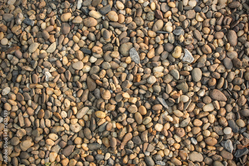 The background of a small stone lying on the ground