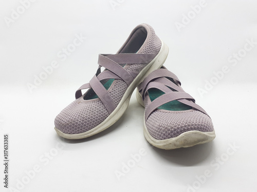 Elegant Healthy Beautiful Colorful Purple Rubber Woman Shoes with Simple Minimalist Design in White Isolated Background