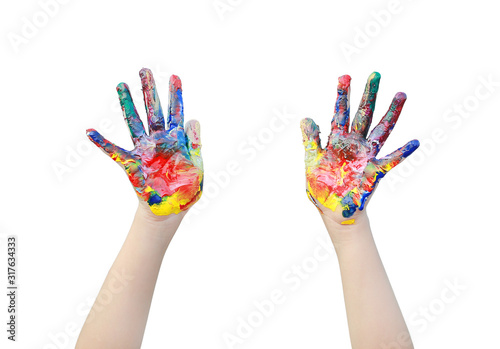 Close up kid hands painted in colorful paints isolated over white background.