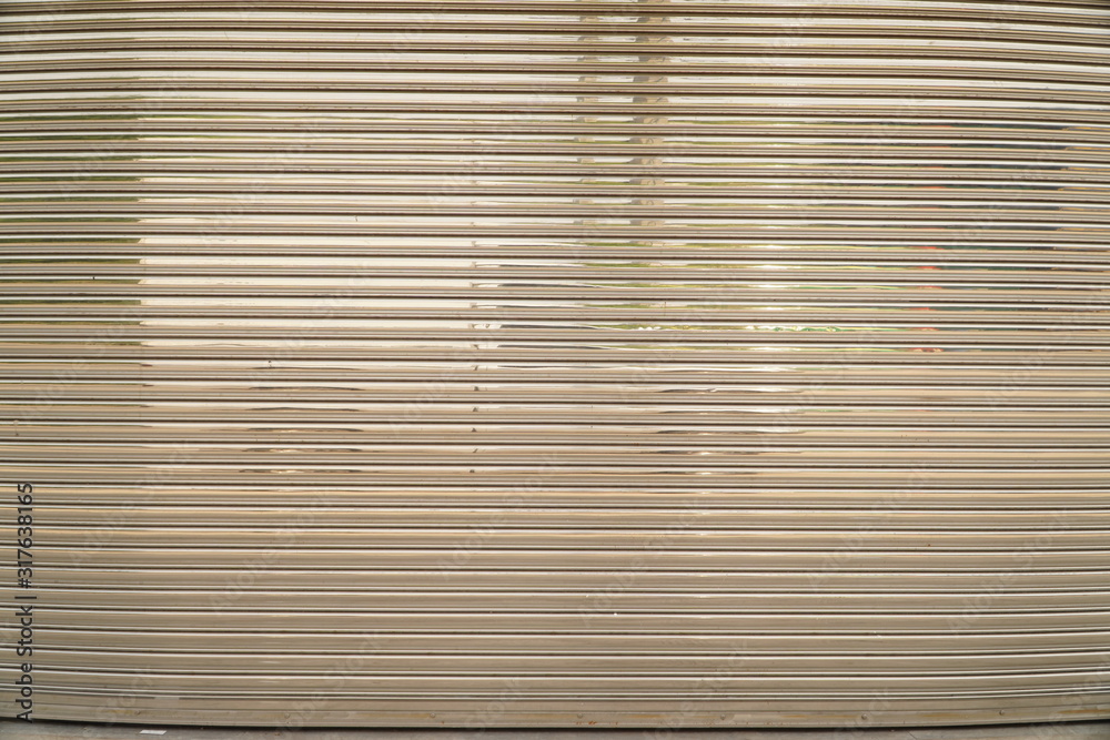 background of the sliding door and the Stainless Rolling Shutter Door  is closed.