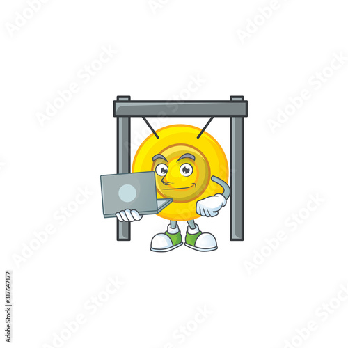 A clever chinese gong mascot character working with laptop