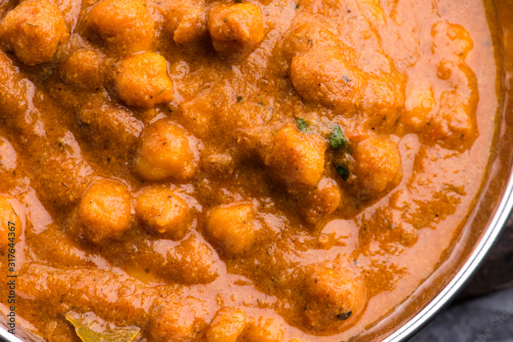 Chana Masala: Traditional Indian dish with chickpeas and curry Chana Masala: Traditional Indian dish with chickpeas and curry