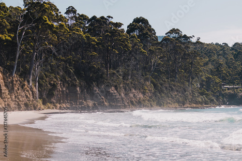 view of the beach next to the Tessalated Pavement in Eaglehack Neck in the Tasman Peninsula photo