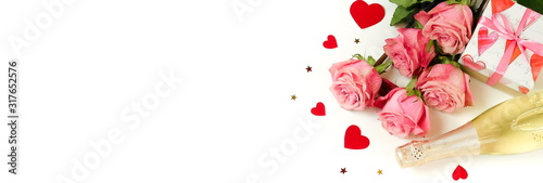 Valentine's day background banner. Bouquet of pink roses flowers, gift box an...