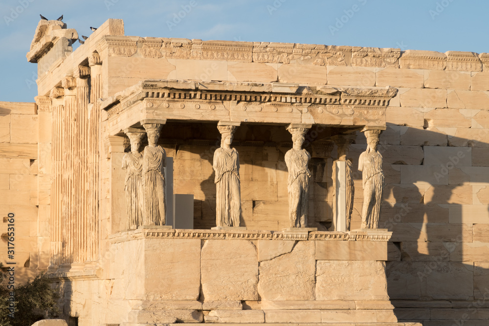 Fototapeta premium Athens, Greece - Dec 20, 2019: Erechtheion Temple with Caryatids, Caryatid Porch, Acropolis, Athens, Greece