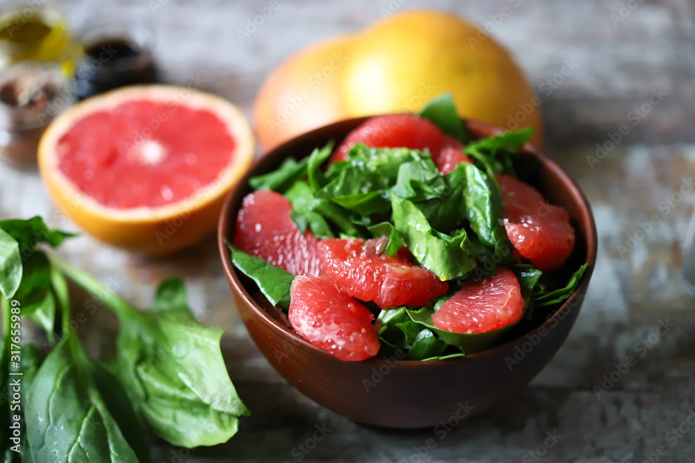 Fresh juicy salad with spinach and grapefruit. Diet salad. Selective focus. Macro. Fresh juicy salad with spinach and grapefruit. Diet salad. Selective focus. Macro.