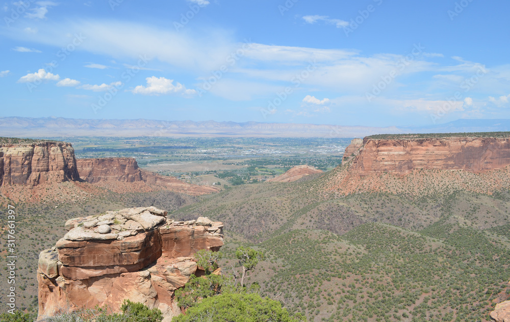 Early Summer in Colorado: Looking Out Monument Canyon to the Colorado River, Grand Valley and the Book Cliffs From Grand View Along Rim Rock Drive in Colorado National Monument
