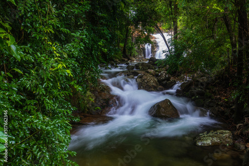 Fototapeta Naklejka Na Ścianę i Meble -  Pi-tu-gro waterfall, Beautiful waterfall in Tak  province, ThaiLand.