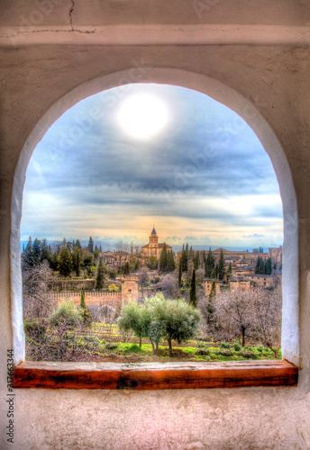 Al Hambra as Seen through a Window at Generalife, Granada, Andalusia, Spain photo