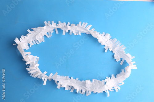 plastic party necklace on colorful background
