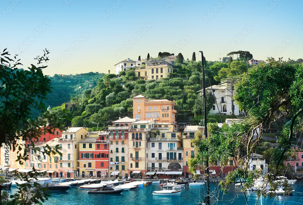 Beautiful view with ships and boats in Portofino in Italy