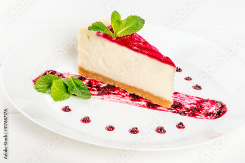 Slice of cheesecake garnished with mint garnished