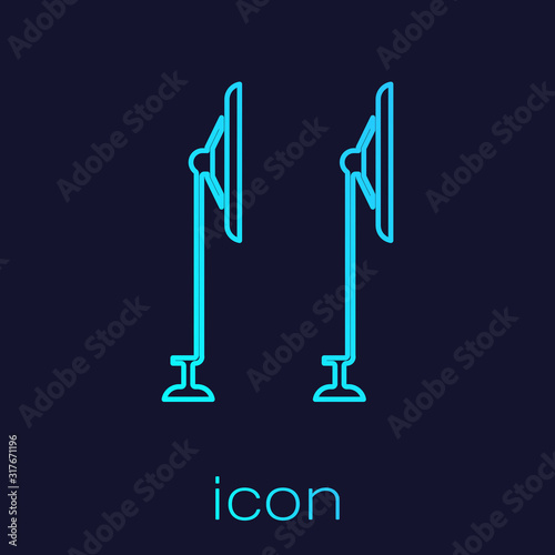 Turquoise line Windscreen wiper icon isolated on blue background. Vector Illustration