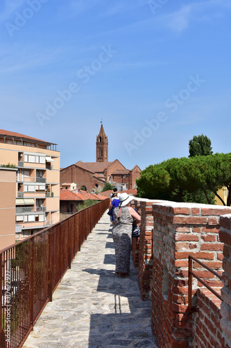 Pisa, Italy architecture, monuments, streets, life, nature in solar rays, summer travel.