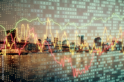 Financial graph on night city scape with tall buildings background double exposure. Analysis concept.