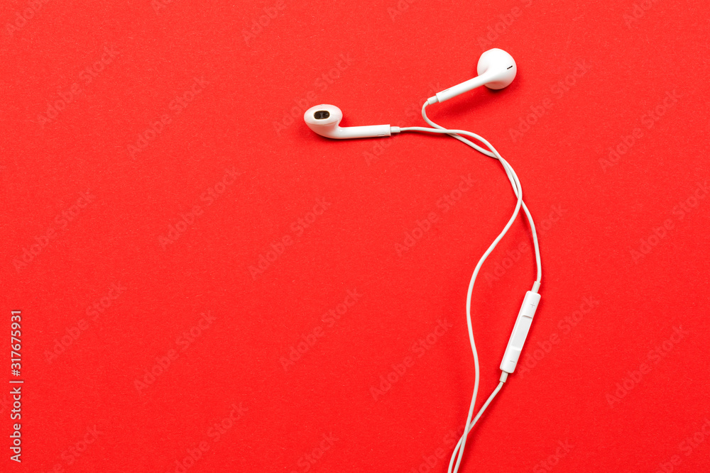 headphones isolated on red background headphones isolated on red background