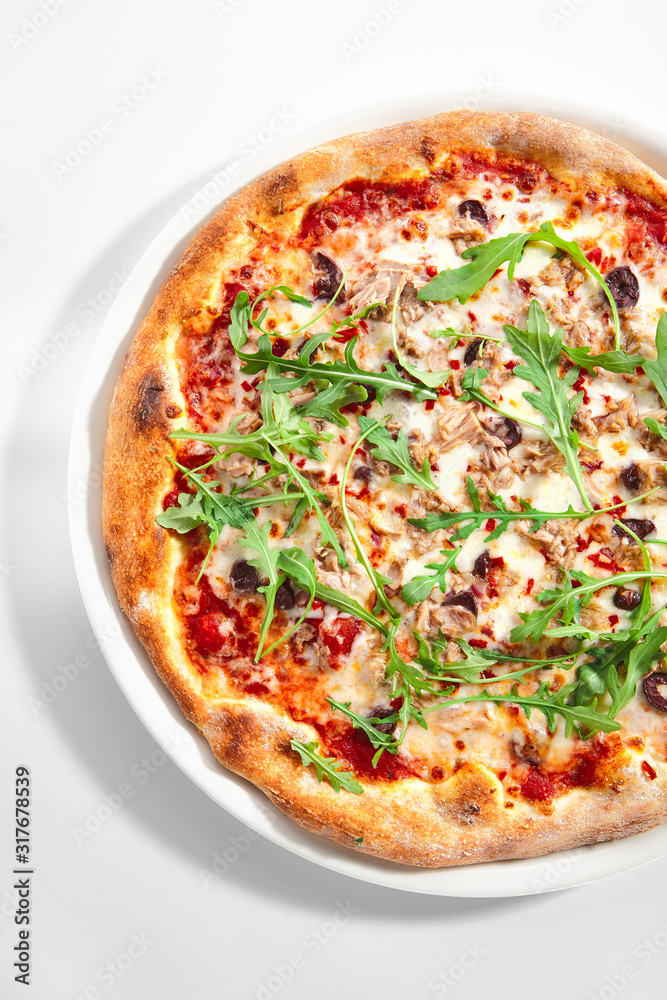 Pizza with Tuna, Olives and Arugula Top View Isolated Pizza with Tuna, Olives and Arugula Top View Isolated