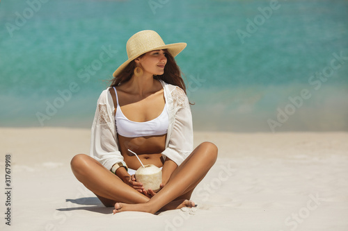 Wallpaper Mural Tanned Woman in Bikini with Coconut on the Beach Torontodigital.ca