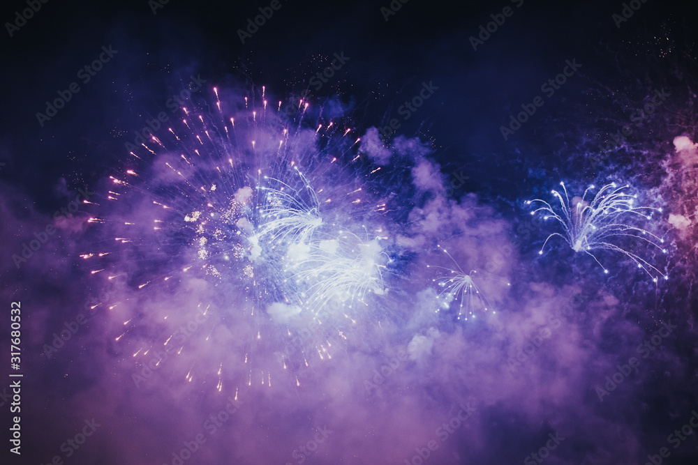 Fototapeta premium Fireworks overlay for holiday backgrounds with copy-space.