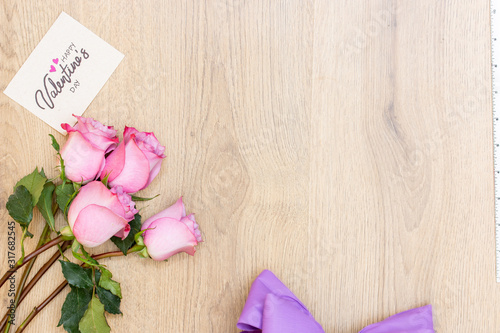 Valentines day mock up with flowers and wooden background