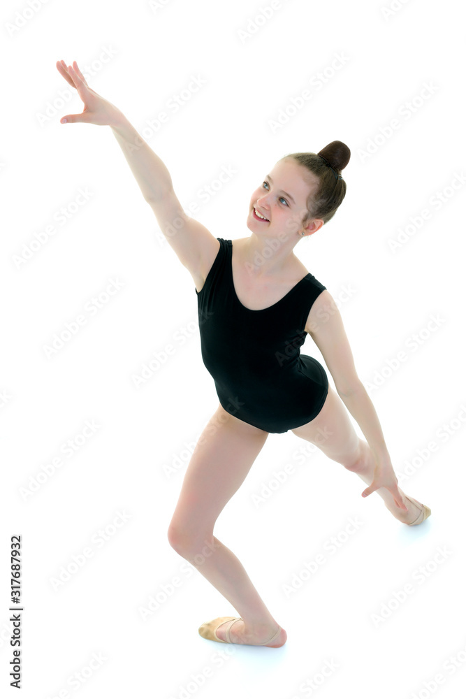 The gymnast prepares to perform the exercise. The gymnast prepares to perform the exercise.