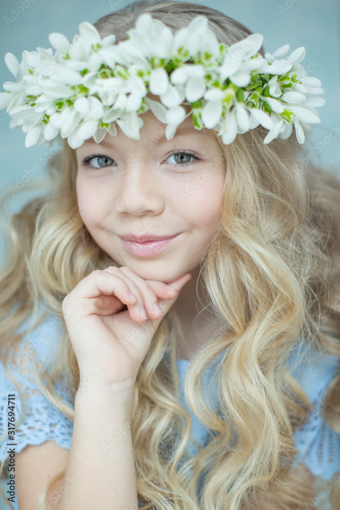 Girl wreath of flowers. Girl with a wreath of flowers on her head. Girl wreath of flowers. Girl with a wreath of flowers on her head.