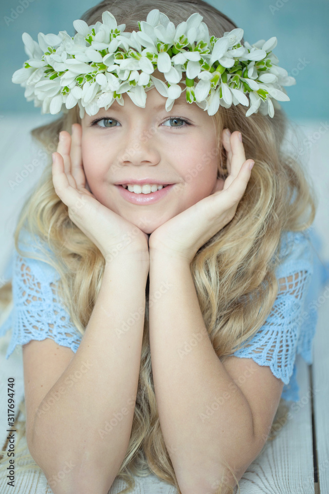 Girl wreath of flowers. Girl with a wreath of flowers on her head. Girl wreath of flowers. Girl with a wreath of flowers on her head.