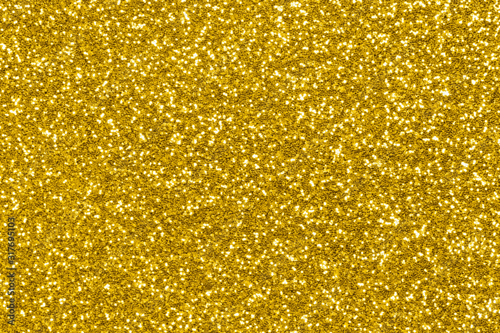 Gold glitter background. Holiday sparkle lights