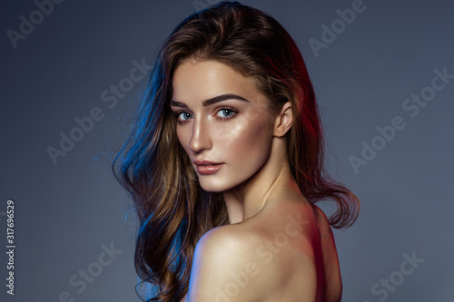 Beauty portrait of young female model with natural make up