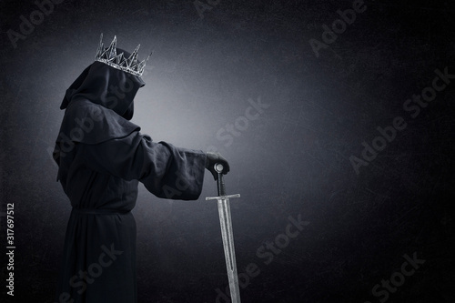 Tablou canvas Ghost of a queen or king with medieval sword in the dark