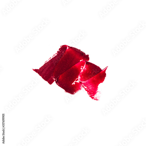 A smear of cream lipstick in Burgundy. Isolated object, white background.