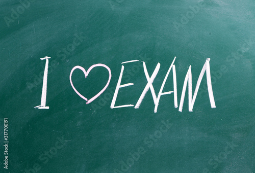 "I love exam" written on blackboard