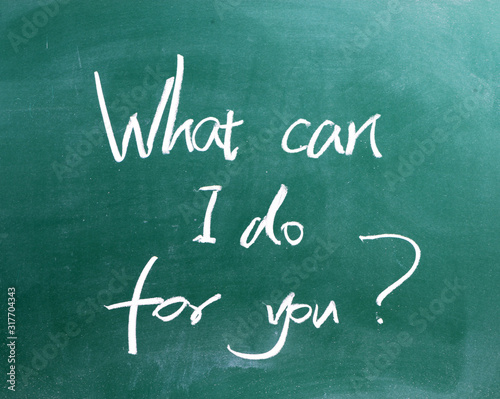 word "What can I do for you" written on blackboard