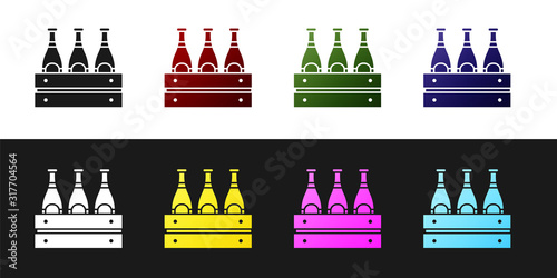 Set Pack of beer bottles icon isolated on black and white background. Wooden box and beer bottles. Case crate beer box sign. Vector Illustration